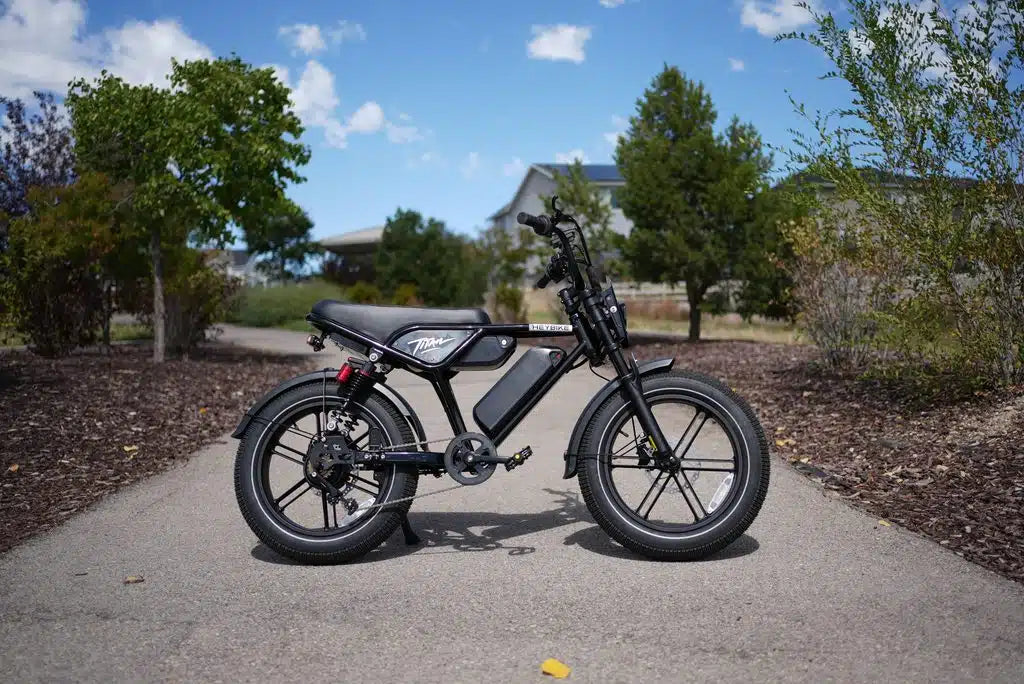 Heybike Titan moped-style eBike parked on a paved path