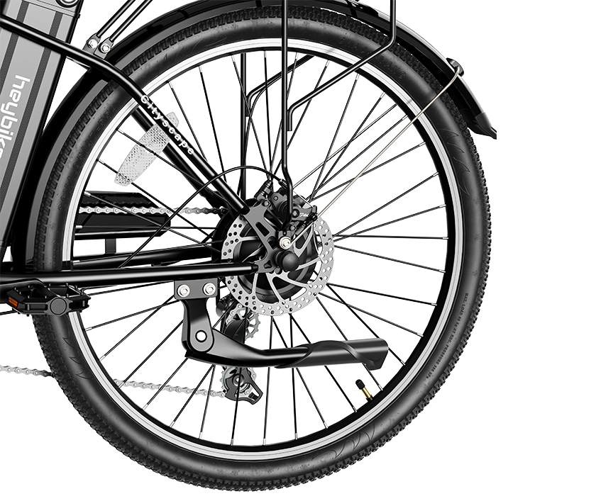 Close-up view of dual-disc brakes, spoke wheels