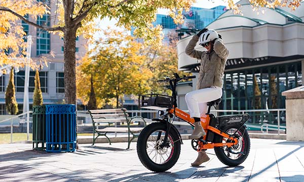 A girl is riding the Mars 2.0 e-bike in the city